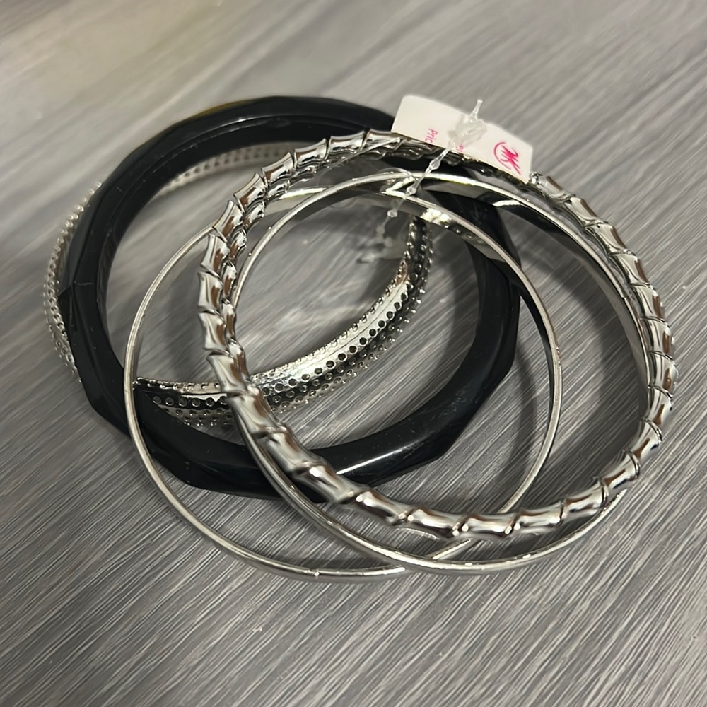 NTW Set of Silver and Black Metal and Plastic Bangle Bracelets